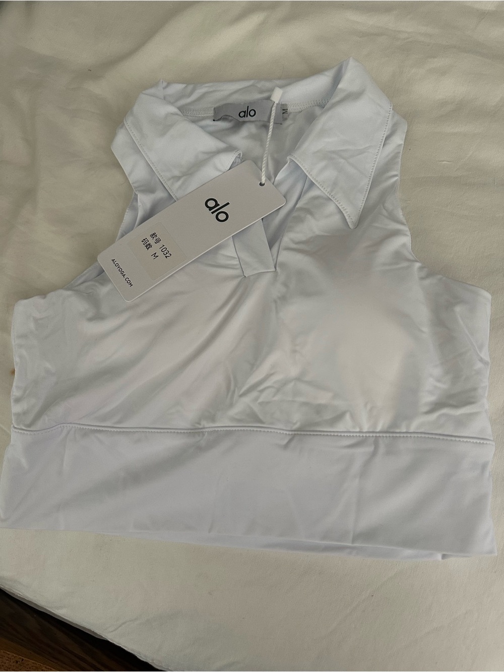 ALO Yoga White Sleeveless Polo Crop Bra